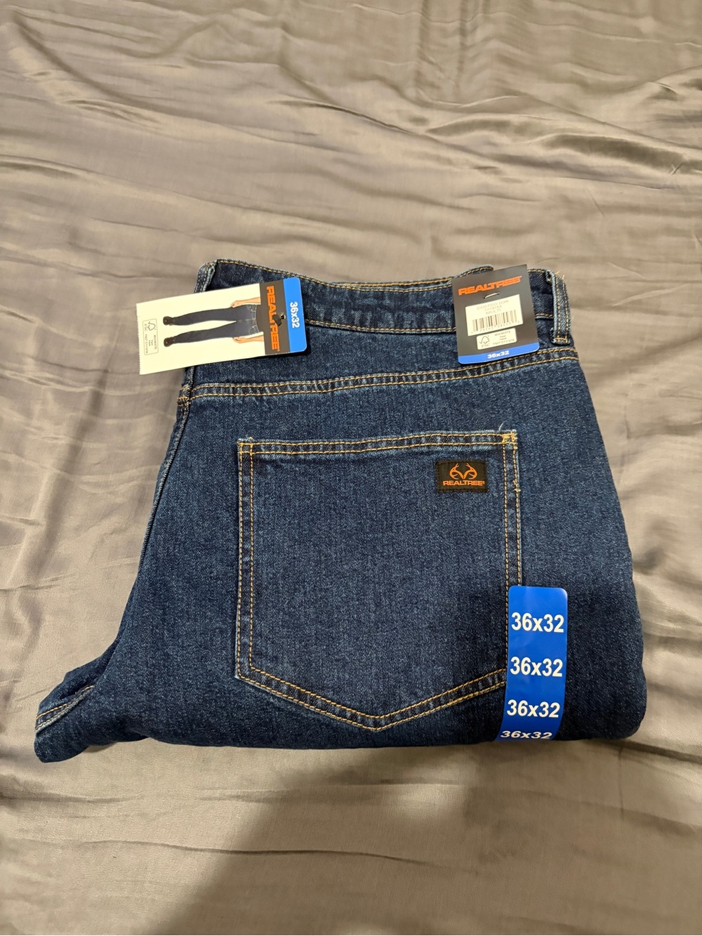 Realtree Men's Relaxed Fit Jean in Dark Blue Denim with Liner. Ideal for winter